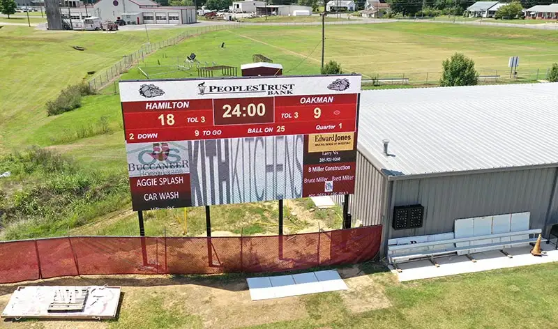 A scoreboard on football court