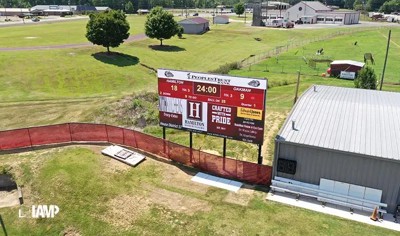 A scoreboard on football court